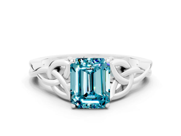 White gold Emerald Cut Blue Topaz Solitaire Celtic Knot Ring with Four-Prong Setting