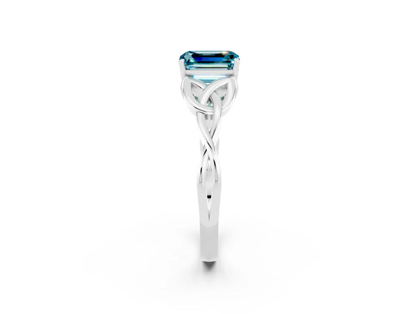 Silver Emerald Cut Blue Topaz Solitaire Celtic Knot Ring with Four-Prong Setting