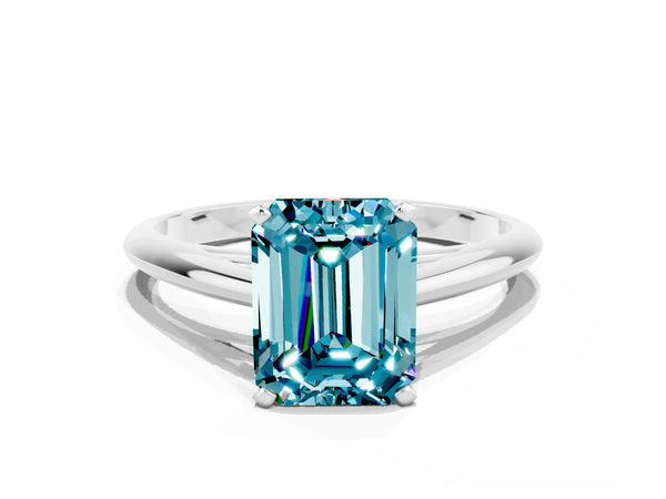 Silver Emerald Cut Blue Topaz Solitaire Engagement Ring with Cathedral Setting and Four-Prong Mount