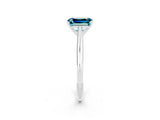 White gold Emerald Cut Blue Topaz Solitaire Engagement Ring with Cathedral Setting and Four-Prong Mount_32