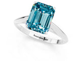 White gold Emerald Cut Blue Topaz Solitaire Engagement Ring with Cathedral Setting and Four-Prong Mount_37