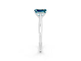White gold Emerald Cut Blue Topaz Solitaire Engagement Ring with Cathedral Setting and Four-Prong Mount_38