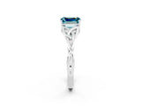 White gold Emerald Cut Blue Topaz Solitaire Engagement Ring with Celtic Knot Band and Four-Prong Setting_2