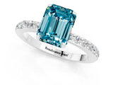 White gold Emerald Cut Blue Topaz Solitaire Engagement Ring with Pavé Band and Four-Prong Setting_1