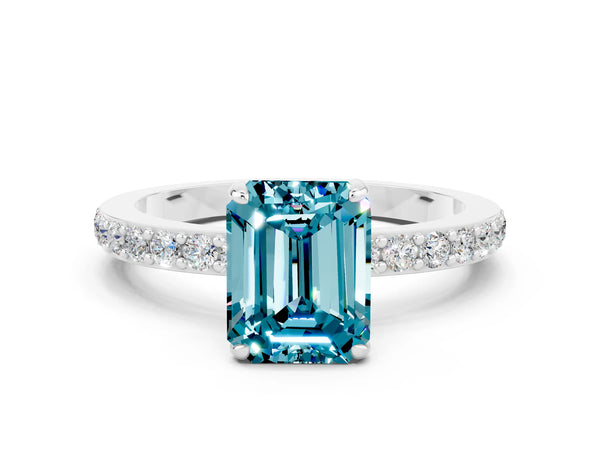 Silver Emerald Cut Blue Topaz Solitaire Engagement Ring with Pavé Band and Four-Prong Setting
