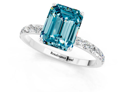 White gold Emerald Cut Blue Topaz Solitaire Engagement Ring with Pavé Band and Prong Setting_1