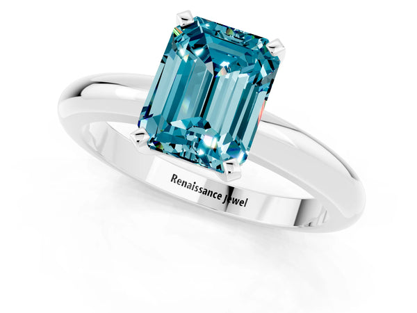Silver Emerald Cut Blue Topaz Solitaire Engagement Ring with Round Band and Four-Prong Setting