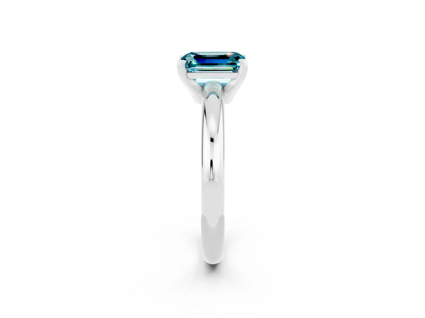 Silver Emerald Cut Blue Topaz Solitaire Engagement Ring with Round Band and Four-Prong Setting