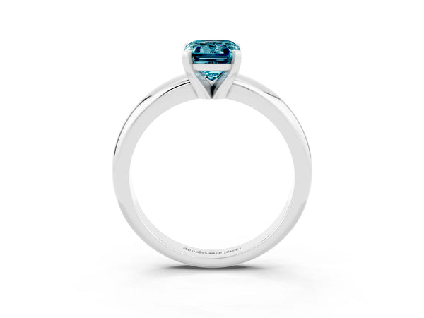 Silver Emerald Cut Blue Topaz Solitaire Engagement Ring with Round Band and Four-Prong Setting