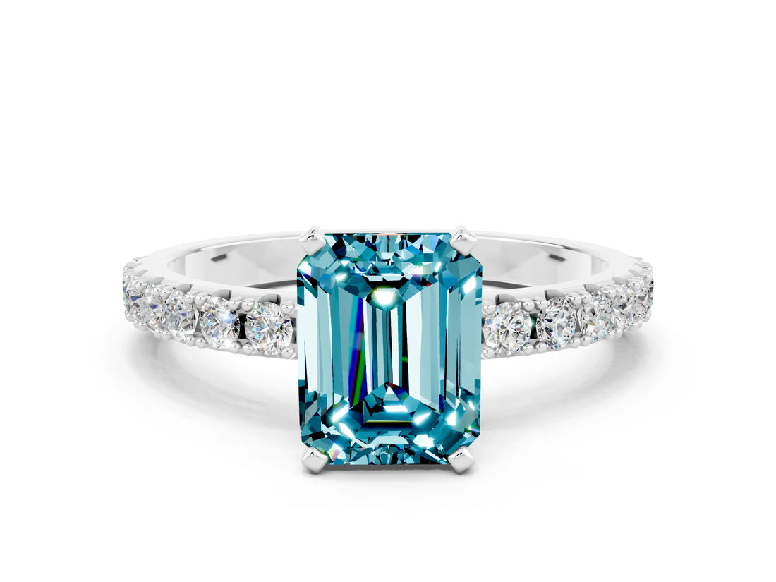 White gold Emerald Cut Blue Topaz Solitaire Pavé Band with Four-Prong Setting