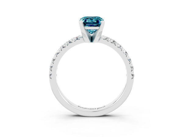Platinum Emerald Cut Blue Topaz Solitaire Pavé Engagement Ring with Round Band and Prong Setting