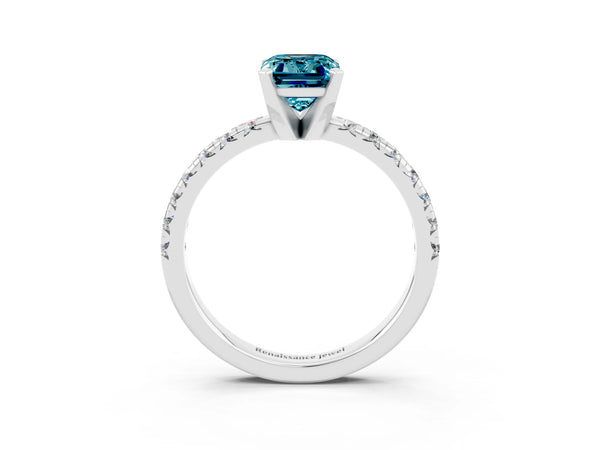 Platinum Emerald Cut Blue Topaz Solitaire Pavé Engagement Ring with Round Band and Prong Setting