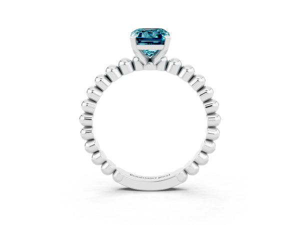 Silver Emerald Cut Blue Topaz Solitaire Ring with Beaded Band and Prong Setting