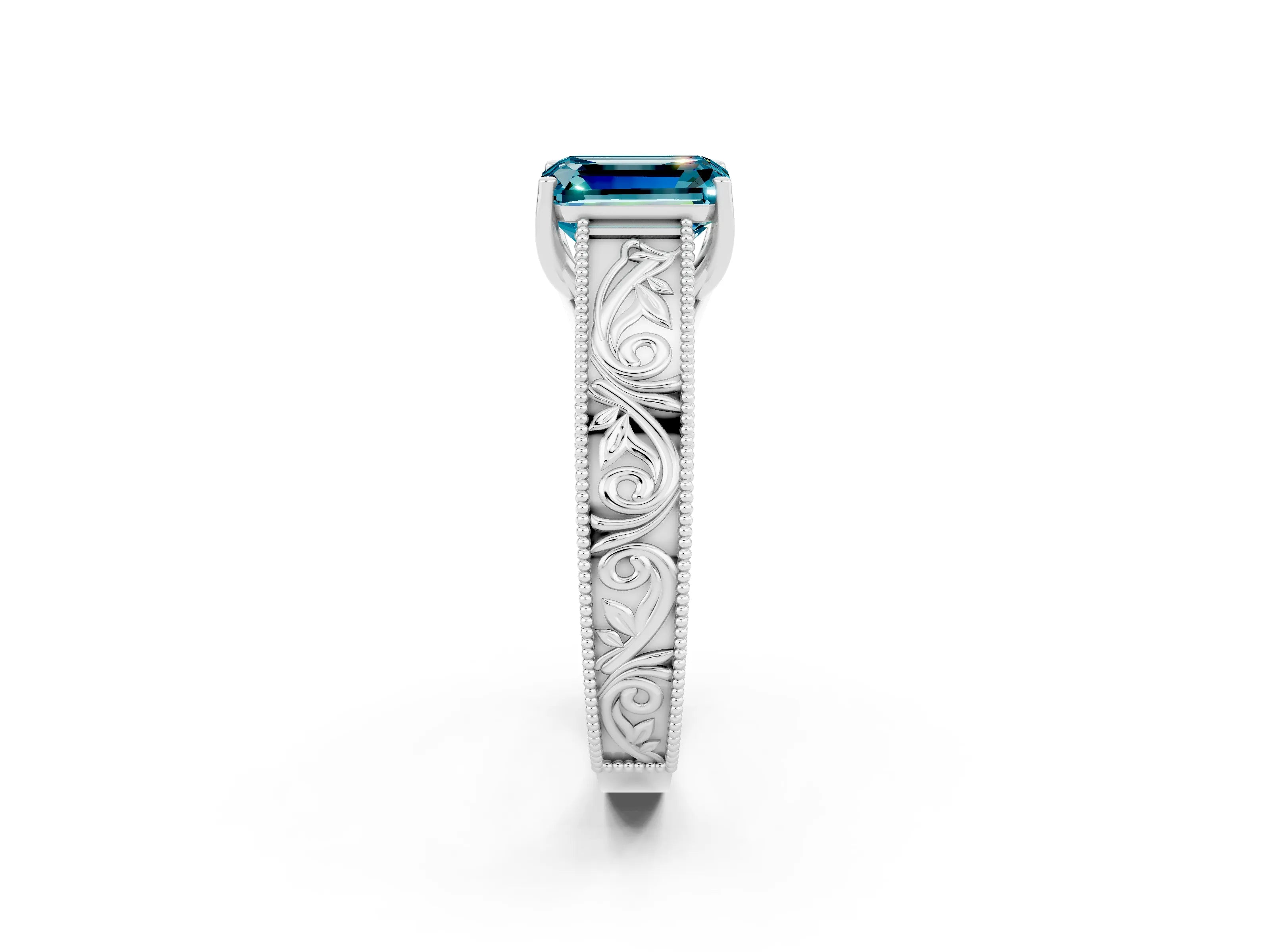 White gold Emerald Cut Blue Topaz Solitaire Ring with Engraved Band and Four-Prong Setting_2
