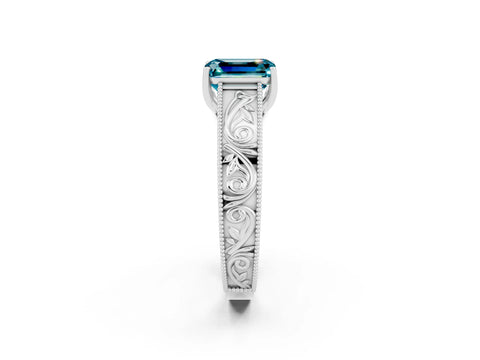 White gold Emerald Cut Blue Topaz Solitaire Ring with Engraved Band and Four-Prong Setting_2