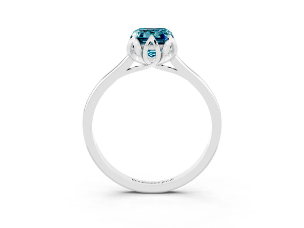 White gold Emerald Cut Blue Topaz Solitaire Ring with Flower Prong Setting and Classic Band