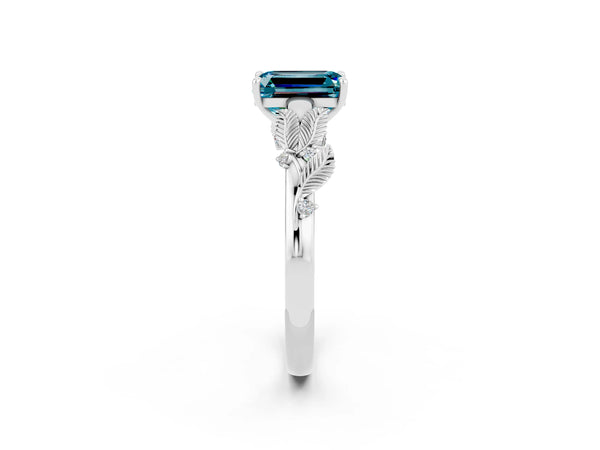 White gold Emerald Cut Blue Topaz Solitaire Ring with Leaf Motif Band and Four-Prong Setting