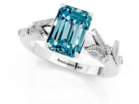 White gold Emerald Cut Blue Topaz Solitaire Ring with Leaf Motif Band and Four-Prong Setting_1