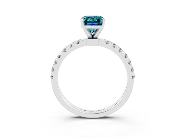 White gold Emerald Cut Blue Topaz Solitaire Ring with Pavé Accents and Four-Prong Setting