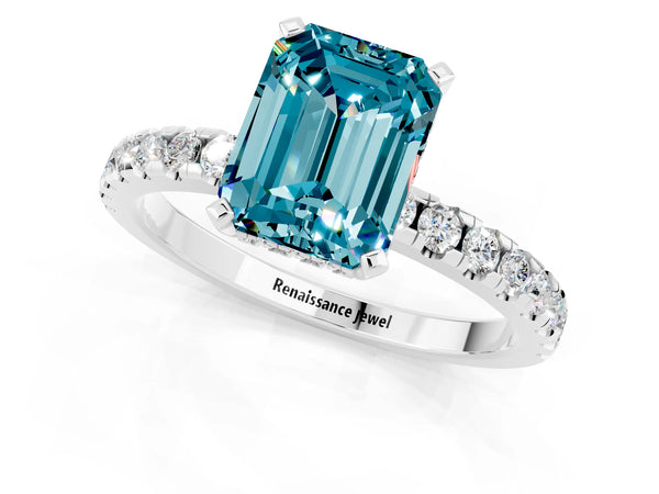 White gold Emerald Cut Blue Topaz Solitaire Ring with Round  Pavé Band and Four-Prong Setting