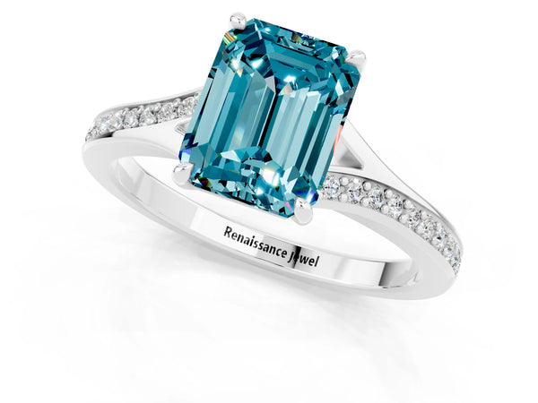 Silver Emerald Cut Blue Topaz Solitaire Ring with Pavé Band and Prong Setting