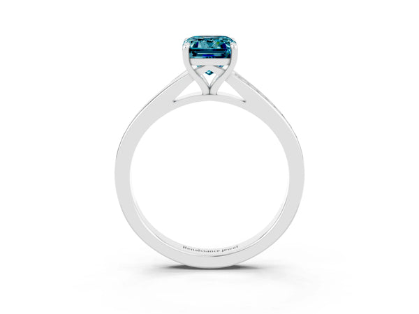 Silver Emerald Cut Blue Topaz Solitaire Ring with Pavé Band and Prong Setting