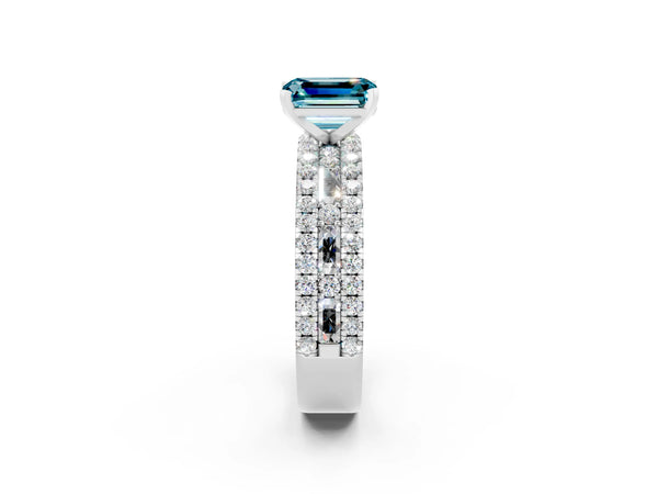 Silver Emerald Cut Blue Topaz Solitaire Ring with Pavé and Channel Set Band
