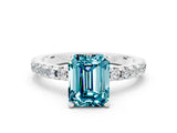White gold Emerald Cut Blue Topaz Solitaire Ring with Round  Pavé Band and Four-Prong Setting_48