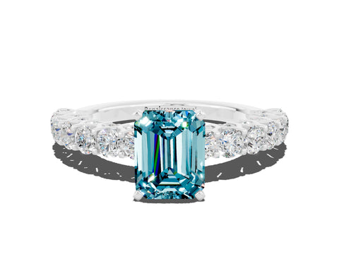 White gold Emerald Cut Blue Topaz Solitaire Ring with Shared Prong Pavé Band and Four-Prong Setting