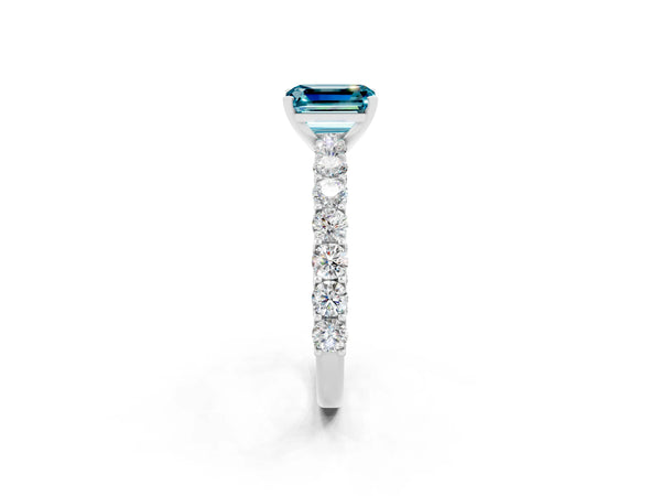 White gold Emerald Cut Blue Topaz Solitaire Ring with Shared Prong Pavé Band and Four-Prong Setting