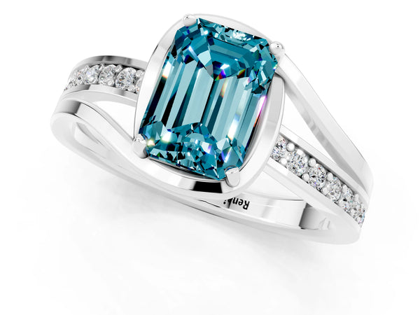 White gold Emerald Cut Blue Topaz Solitaire Ring with Split Shank and Prong Setting