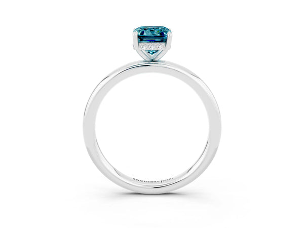 Silver Emerald Cut Blue Topaz Solitaire Ring with Thin Band and Four-Prong Setting