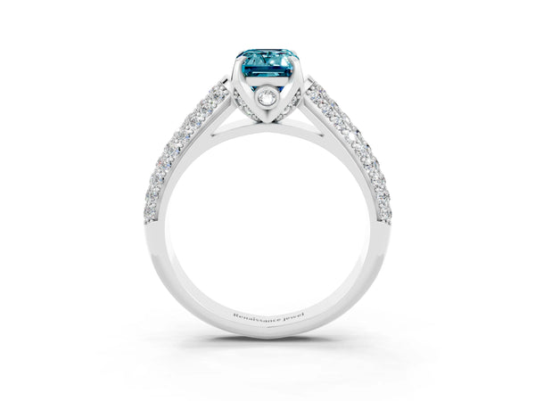 Platinum Emerald Cut Blue Topaz Solitaire Ring with Three-Row Pavé Band and Four-Prong Setting