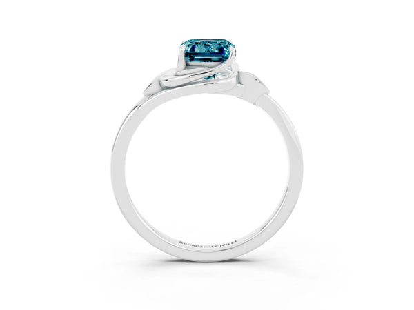 Silver Emerald Cut Blue Topaz Solitaire Ring with Twist Band and Four-Prong Setting