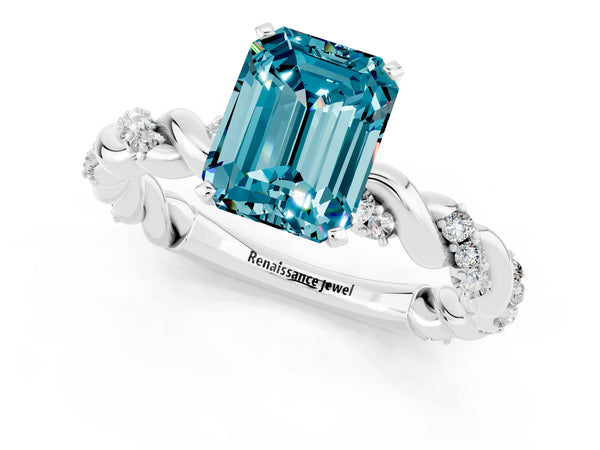 White gold Emerald Cut Blue Topaz Solitaire Ring with Twisted Band and Pavé Accents
