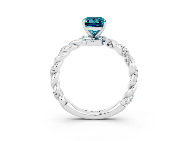 Silver Emerald Cut Blue Topaz Solitaire Ring with Twisted Band and Pavé Accents