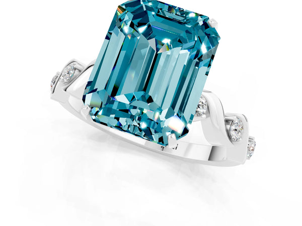 Platinum Emerald Cut Blue Topaz Solitaire Twisted Band with Round  Accents and Prong Setting