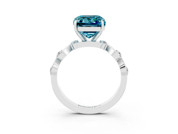 Platinum Emerald Cut Blue Topaz Solitaire Twisted Band with Round  Accents and Prong Setting