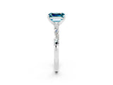 White gold Emerald Cut Blue Topaz Solitaire with Side Baguettes and Channel Set Band_2