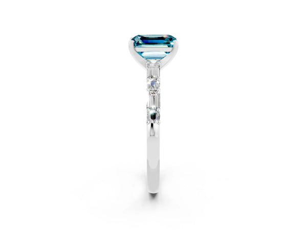 Silver Emerald Cut Blue Topaz Solitaire with Side Baguettes and Channel Set Band