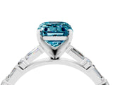 White gold Emerald Cut Blue Topaz Solitaire with Side Baguettes and Channel Set Band_4