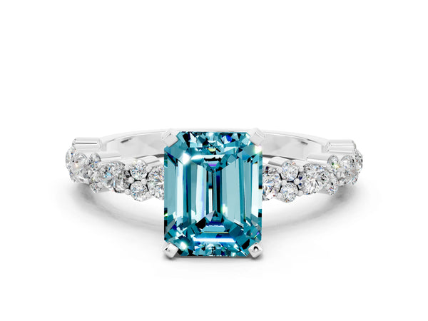 White gold Emerald Cut Blue Topaz Side Stone Solitaire Ring with Round  and Four-Prong Setting