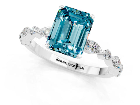 White gold Emerald Cut Blue Topaz Solitaire with Side Stones on a Pavé Band and Four-Prong Setting_1