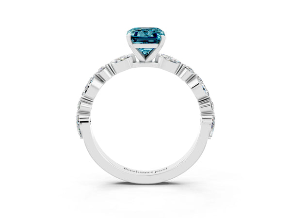 White gold Emerald Cut Blue Topaz Ring with Marquise and Round  Side Stones and Four-Prong Setting