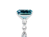 White gold Emerald Cut Blue Topaz Solitaire with Side Stones on a Pavé Band and Four-Prong Setting_5