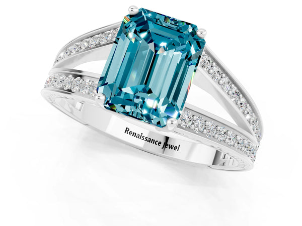 Platinum Emerald Cut Blue Topaz Split Shank Ring with Pavé Band and Four-Prong Setting