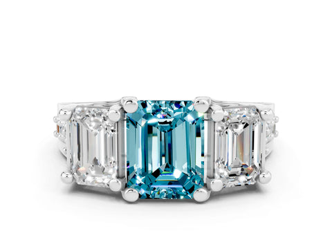 White gold Emerald Cut Blue Topaz Three-Stone Ring with Channel Set Band and Four-Prong Setting