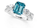 White gold Emerald Cut Blue Topaz Three-Stone Ring with Pavé Split Shank and Four-Prong Setting_1