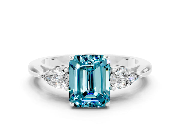 Silver Emerald Cut Blue Topaz Three-Stone Ring with Pear  Side Stones and Prong Setting