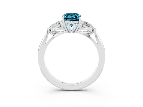 White gold Emerald Cut Blue Topaz Three-Stone Ring with Pear  Side Stones and Prong Setting